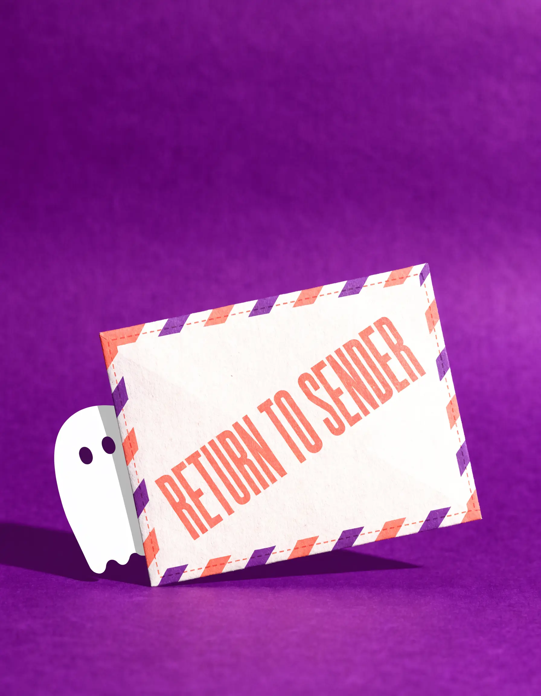 An airmail envelope stamped “Return to Sender”, with a spam ghost being turned away — Spambuster’s promise in one image.